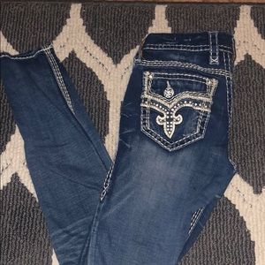Rock revival dark wash skinny jeans